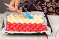 Chef Hand Brush the Dough Chigiri or Bubbles Bread, Pull Apart Hokkaido Soft Milk Bread. A Pan of Soft and Fluffy Japanese Bread