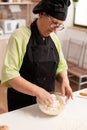 Chef hand in wheat flour