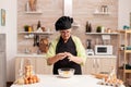 Chef hands with flour and eggs