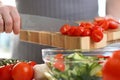 Chef Hands Pouring Cherry Tomato Cucumber Salad Royalty Free Stock Photo