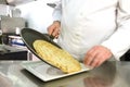 Chef hands serving pancake Royalty Free Stock Photo