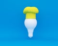 Chef hat with Light bulb concept on blue background. minimal business concept and food idea