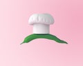 Chef hat with pepper concept on pastel pink background. minimal