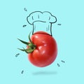 Chef hat with tomato concept on pastel blue background. minimal idea food and fruit creative concept