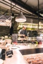 A chef in his open space kitchen in a restaurant in a hotel in Hong Kong