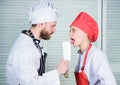 Chef hold cleaver knife tool while woman lick blade. Cooking is sexy. Sharp knife professional tool. Man use sharp