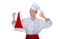 Chef holding chopsticks cap of Santa Claus Royalty Free Stock Photo