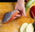 Chef is holding fresh salmon filett Royalty Free Stock Photo