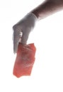 Chef is holding a piece of salmon to cook great vegetarian dinner Royalty Free Stock Photo