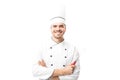 Chef holding a whisker and smiling Royalty Free Stock Photo