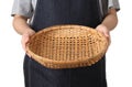 Chef holding wooden basket on white background