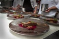 Chef in hotel or restaurant kitchen cooking for dinner Royalty Free Stock Photo