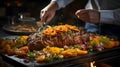 Chef in restaurant kitchen cooking preparing beef steak