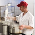 Chef in industrial kitchen Royalty Free Stock Photo