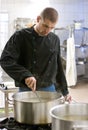 Chef in industrial kitchen Royalty Free Stock Photo