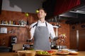 Chef Juggling Fruits in Kitchen