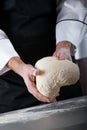 Chef kneading dough Royalty Free Stock Photo