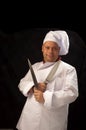 Chef with knifes Royalty Free Stock Photo