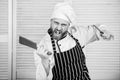 Chef with knifes. Professional in kitchen. culinary cuisine. angry bearded man with knife. love eating food. confident Royalty Free Stock Photo