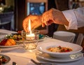 Chef Lighting Candle for Elegant Dining Experience Royalty Free Stock Photo