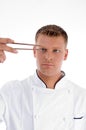 Chef looking chopsticks Royalty Free Stock Photo