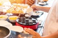 Chef make the dessert on the table and pour coconut milk Royalty Free Stock Photo