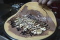 Chef makes chocolate banana crepe on hot pan