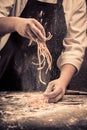 The chef makes fresh spaghetti from scratch. Royalty Free Stock Photo