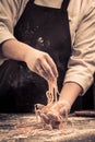 The chef makes fresh spaghetti from scratch. Royalty Free Stock Photo