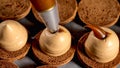 Chef is making caramel macarons, close-up.