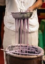 Chef making chinese noodles on market in Chongqing