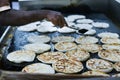 Chef making or cooking Indian flat bread Kerala porotta, Malabar porotta, roti paratha layered bread made of whole wheat flour Royalty Free Stock Photo