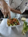 Chef making fatoush salad dubai UAE Royalty Free Stock Photo