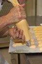 Chef making homemade bakery name is choux cream