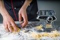 Chef making noodles for a restaurant in a kitchen8