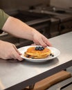Chef making pancakes wuth blueberries Royalty Free Stock Photo