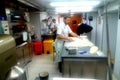 Chef making pastry in ships galley Royalty Free Stock Photo