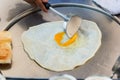 Chef making roti and egg