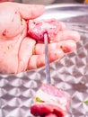 A chef making shish kebab of red meat Royalty Free Stock Photo