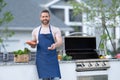 chef man cooking grilled salmon outdoor, banner. grilled salmon fish at man wear chef apron.