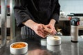 Chef or patissier preparing dessert