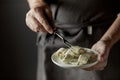 Chef with a plateful of decorative butter curls Royalty Free Stock Photo