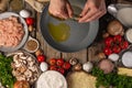 Chef Pours Oil Frying Pan Frying Background Ingredients Mushrooms Meat VegetablesChef pours oil on a frying pan for frying. On a