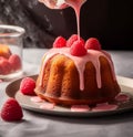 The chef pours sweet pink icing on a rum baba cake