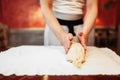 Chef prepares classic apple strudel for baking Royalty Free Stock Photo
