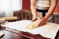 Chef prepares classic apple strudel for baking Royalty Free Stock Photo