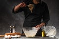 The chef prepares the dough for the preparation of confectionery. Working with the dough Royalty Free Stock Photo