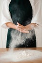 The chef prepares the dough - the process of making dough in the kitchen Royalty Free Stock Photo