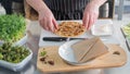 The chef prepares a flatbread with herbs. Royalty Free Stock Photo