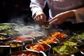 a chef prepares gourmet smoked vegetables for restaurant presentation